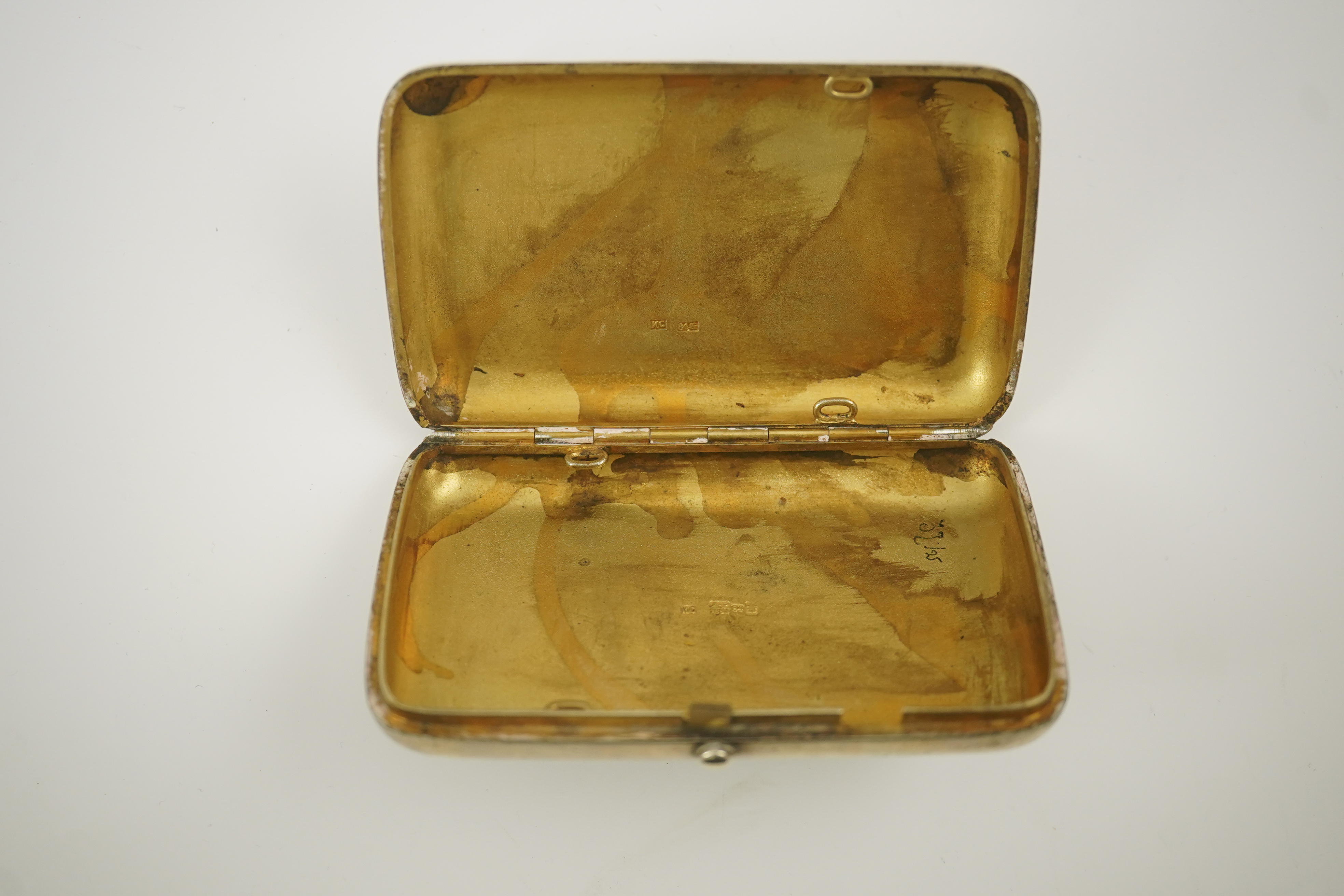 A late 19th century Russian 84 zolotnik and niello cigarette case, assay master A. Romanov, master Ivan F. Smirnov?